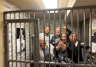 Boomcycle Digital Marketing team members posing together at escape room in Modesto