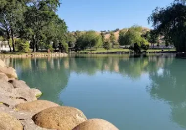 Oak Hill Park waterfront in Danville, CA with calm water and trees