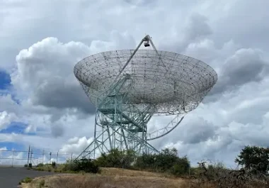 Stanford Dish satellite antenna in Palo Alto against cloudy sky